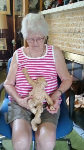 Friends Life Care Member Julia Haas showing off art