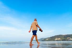 man walking to avoid sedentary lifestyle