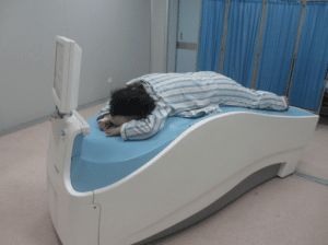 woman using positron Emission Mammography