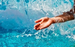 Image of hand in moving water 