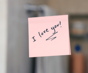 i love you written on a post it note