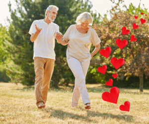 senior baby boomer couple holding hands quality time love