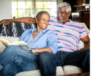 black senior couple reading