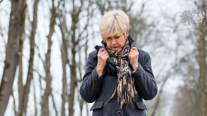 sad senior in winter outdoors