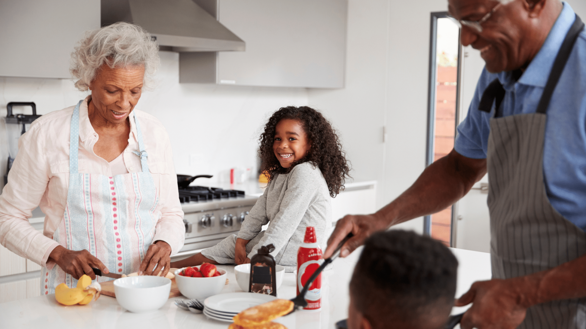 grandparents and grandchildren cooking black older adults