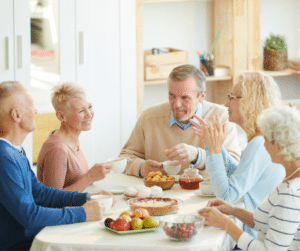 happy seniors enjoying a meal