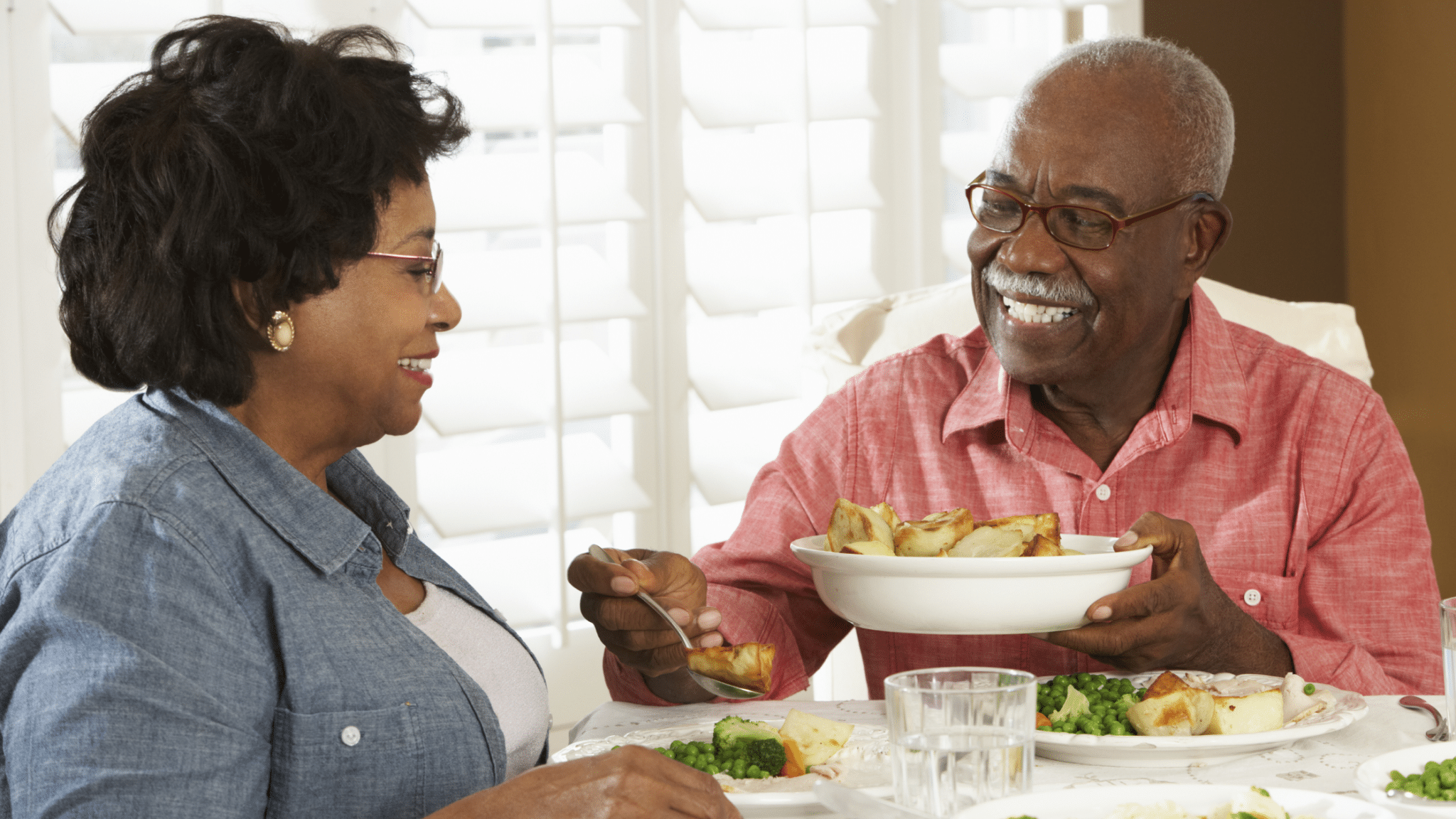 seniors eating at home black people