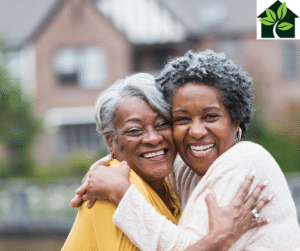 two senior women hugging