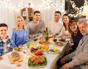 family at thanksgiving dinner table