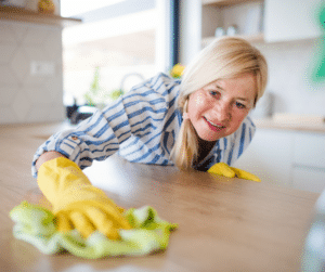 baby boomer woman cleaning