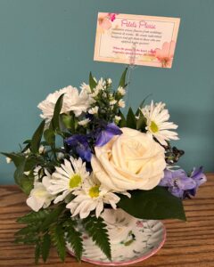 flower arrangement in a cup