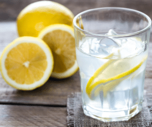 glass of water with lemon hydration
